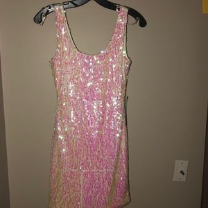 White mini dress with pink holographic beads